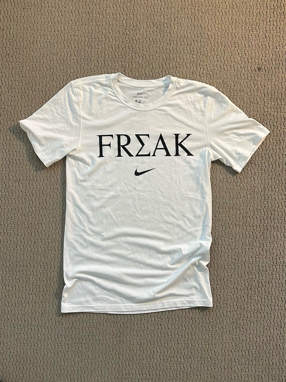 Nike White 'FREAK' Graphic Short Sleeve Tee with Black Logo